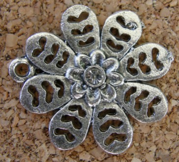 Fleur argentée avec pierre, diamètre de 22mm